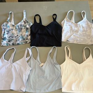 6 size 2 lulu Lemon tops. Very lightly worn. All tags still in